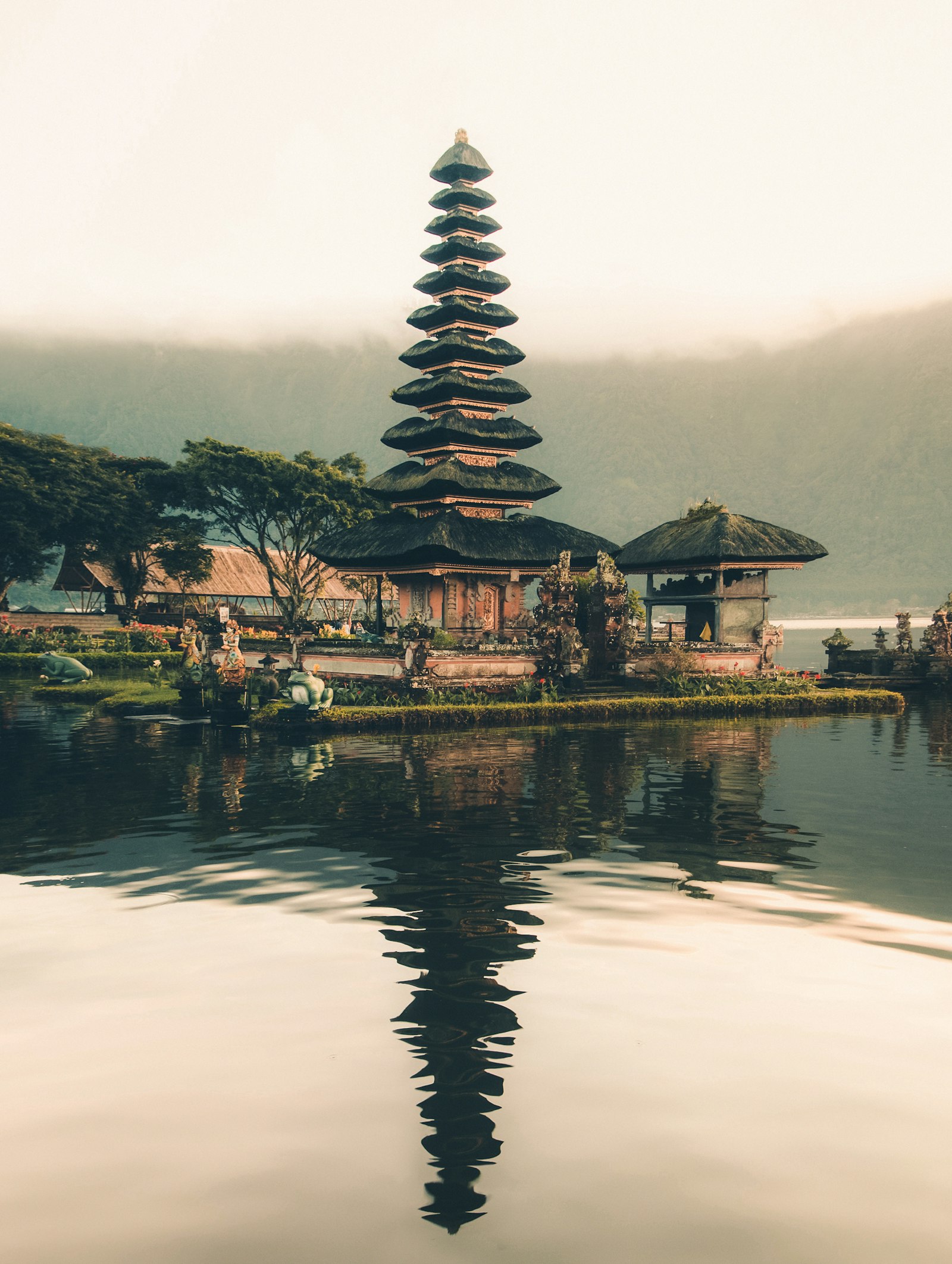 Balinese water temple mirrored in a still lake